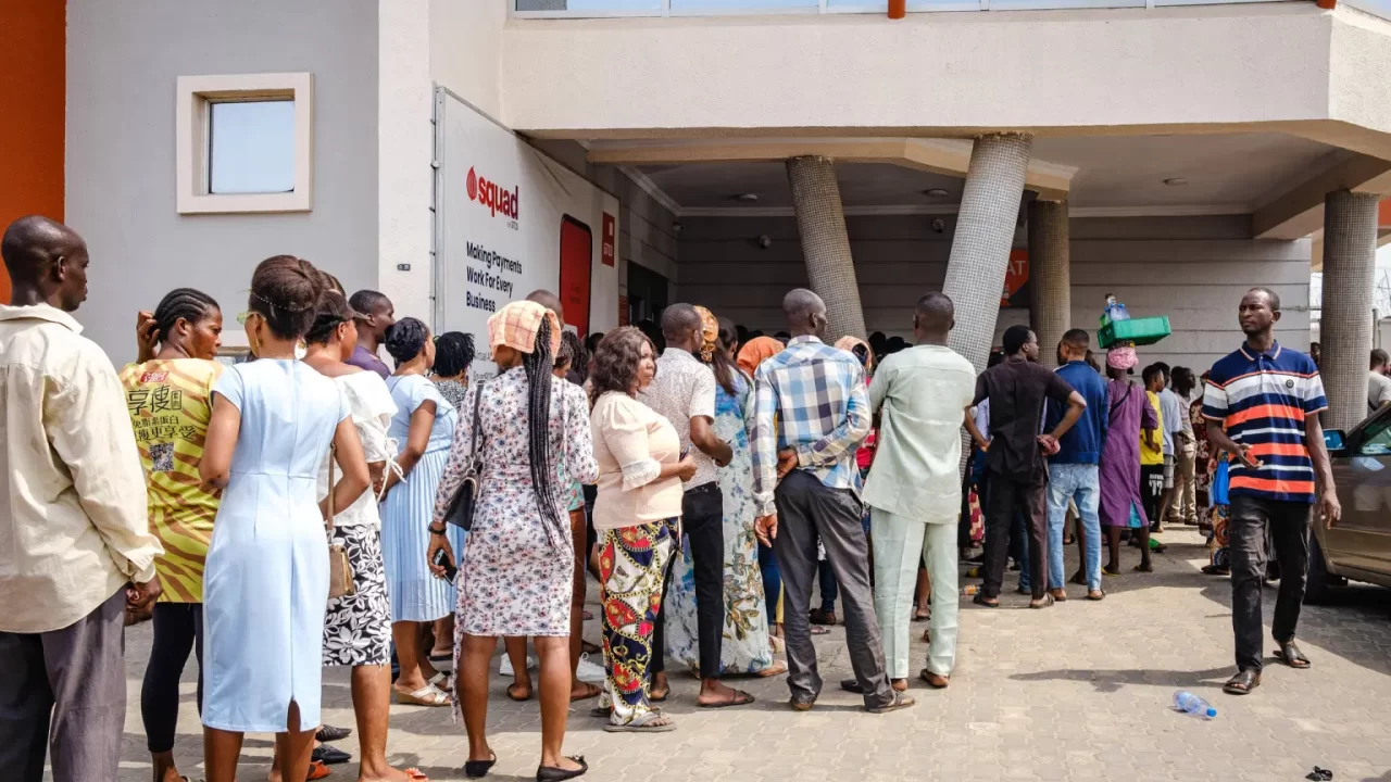 Nigerians complain as poverty is made worse by a lack of money.